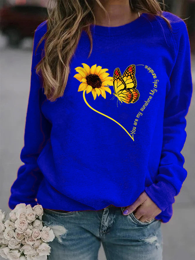 Sweatshirt pour femmes avec motif graphique de papillon et de tournesol Chic & Stil