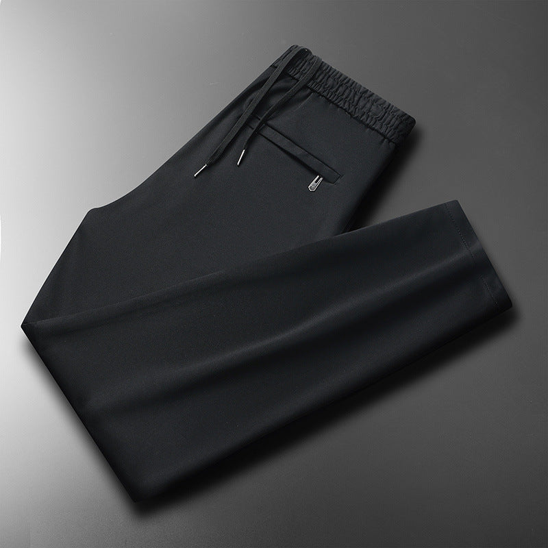 Versatile men's sports pants with elastic waistband and functional pockets Lune London