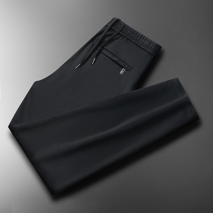 Versatile men's sports pants with elastic waistband and functional pockets Lune London