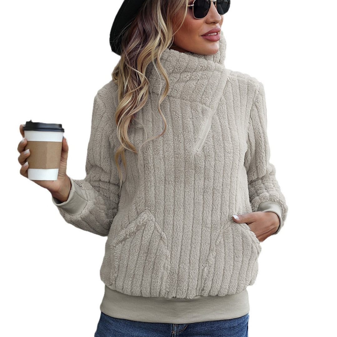 Fleece sweater for women with a high collar and side pockets. Lune London