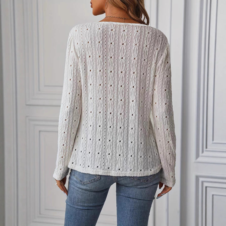 Long sleeve blouse for women with an intricate crochet pattern and chic button details