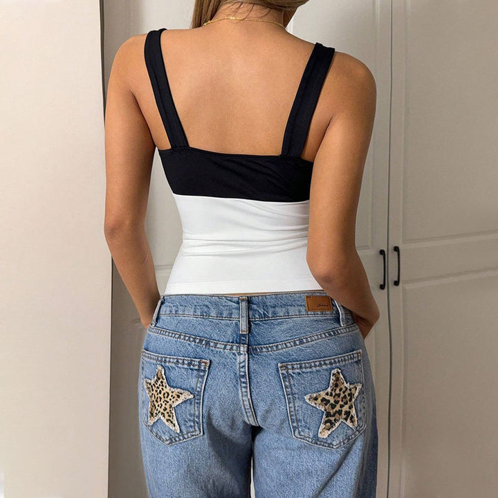 Haut court élégant pour femmes avec design asymétrique et couleurs contrastées Chic & Stil