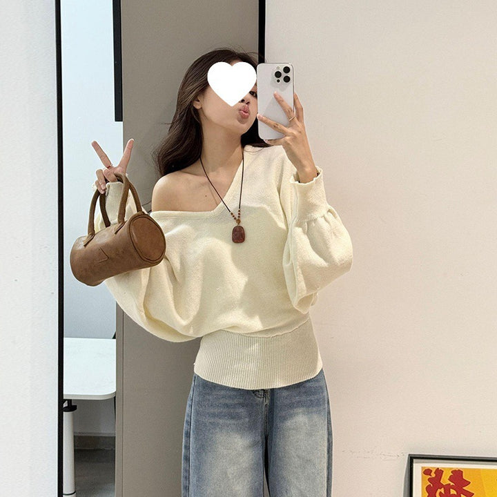 Pull moderne pour femmes avec col en V et ceinture à nouer optionnelle Chic & Stil