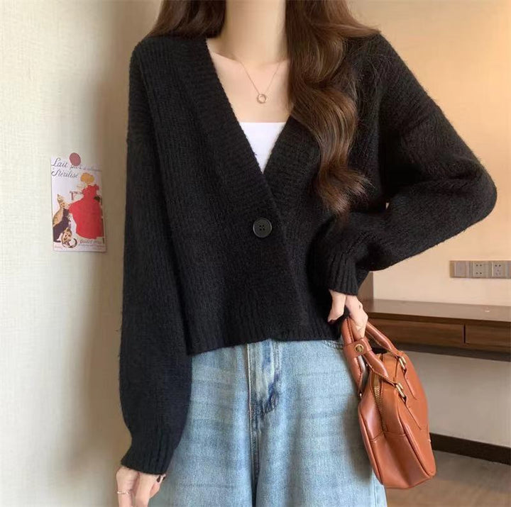 Cardigan tendance femme avec décolleté en V profond et fermeture à boutons Chic & Stil
