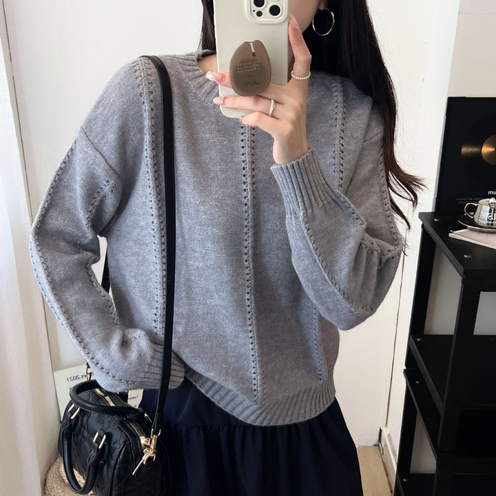 Pull en maille épaisse pour femmes avec une silhouette féminine et un design texturé Chic & Stil