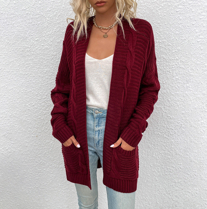 Cardigan en tricot épais pour femmes avec décolleté en V plongeant et poches pratiques Chic & Stil