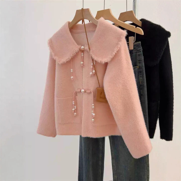 Cardigan féminin élégant avec détails en perles Chic & Stil