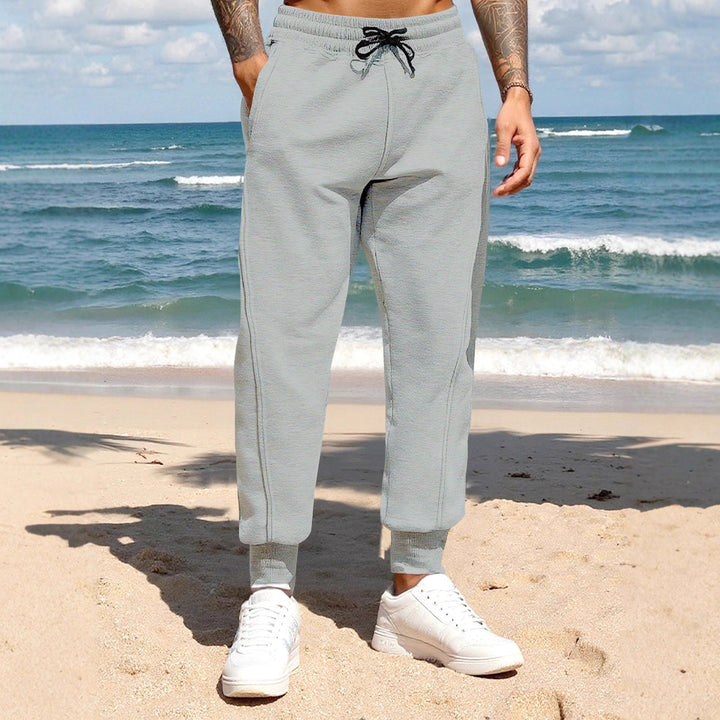 Casual sports pants for men with elastic waistband and practical side pockets Lune London