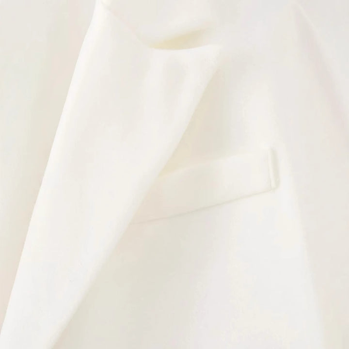 Elegant long coat for women with frayed details Lune London