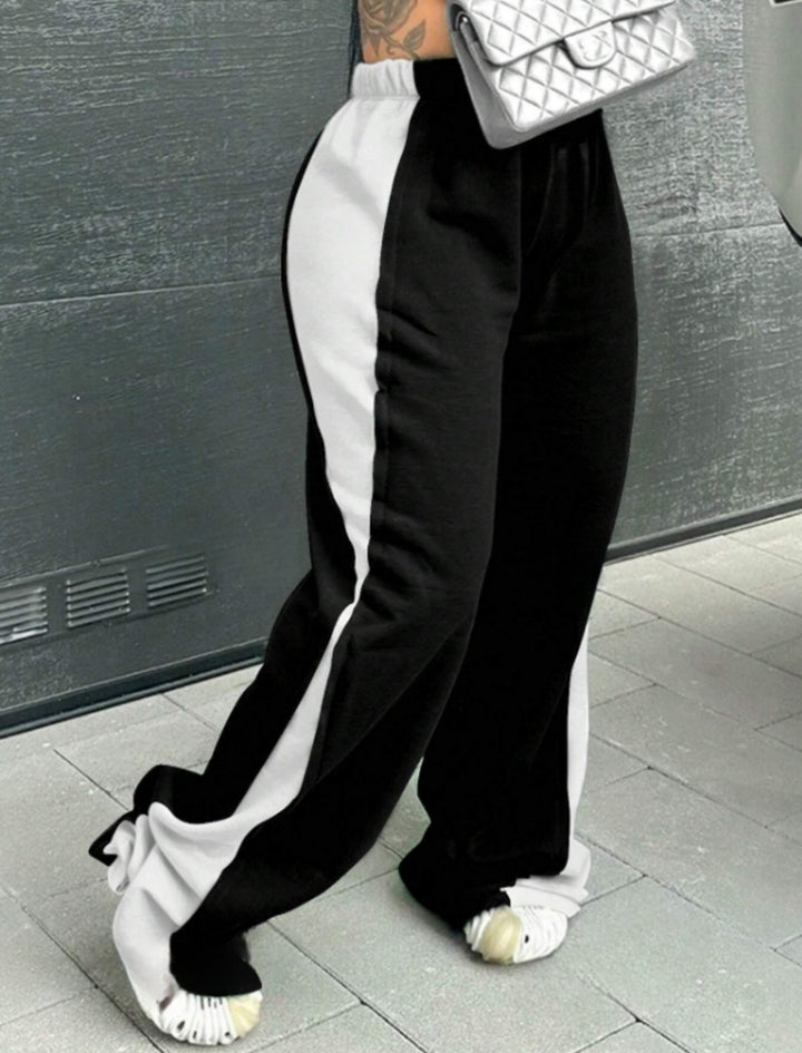 Casual women's sports pants with colorful side inserts and an elastic waistband Lune London