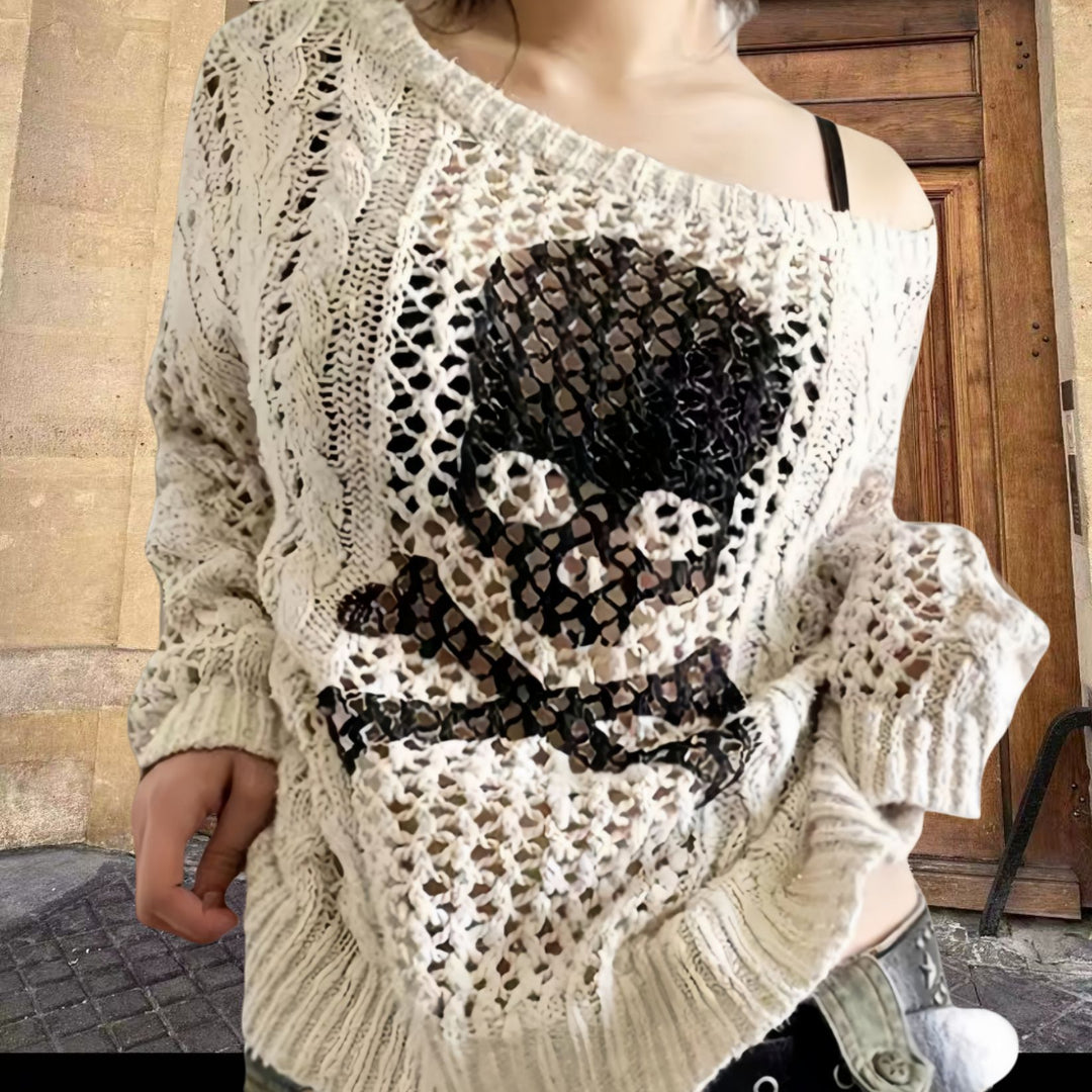 Oversized knit sweater for women with a creative hole pattern and a chic anchor design