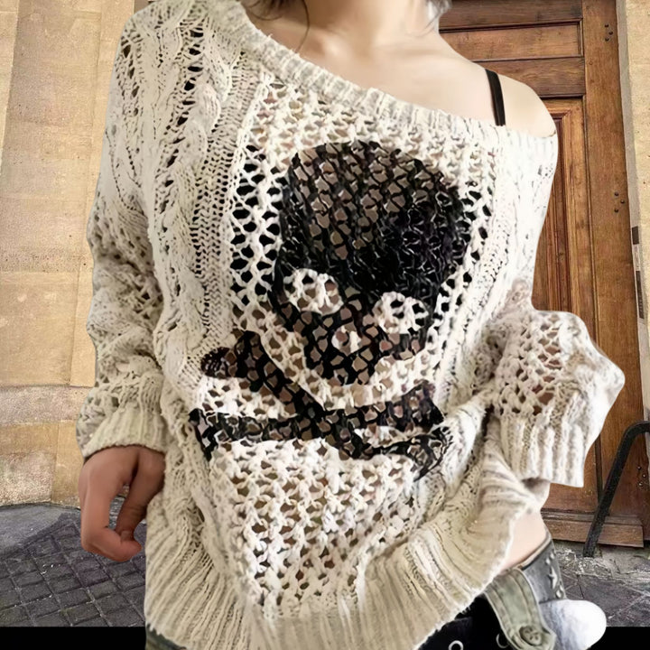 Oversized knit sweater for women with a creative hole pattern and a chic anchor design