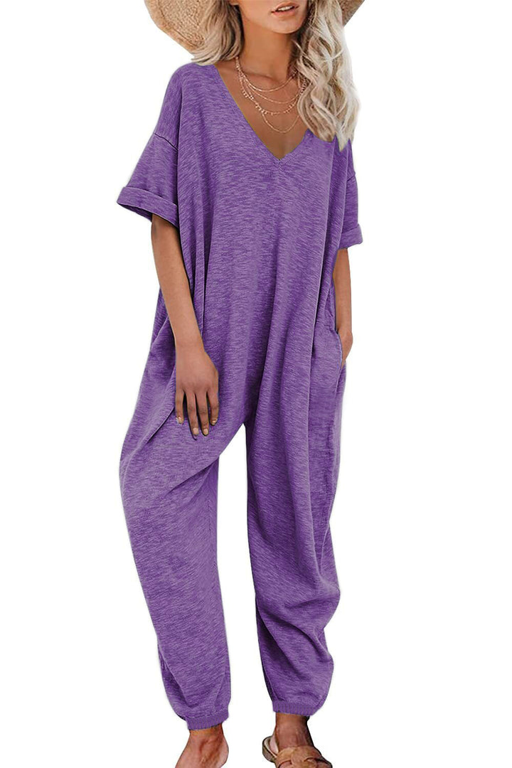 Oversized jumpsuit for women with deep V-neckline and casual pockets Lune London