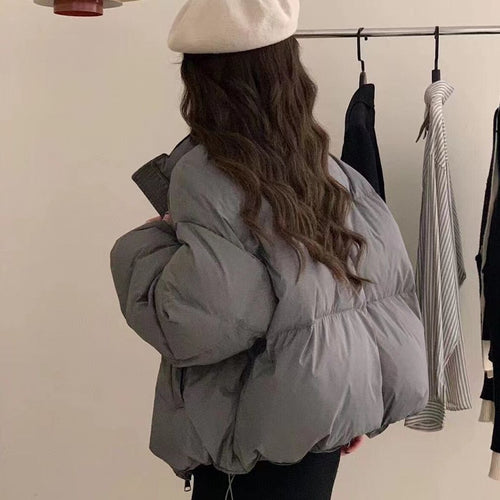 Ladies oversized puffer jacket with elastic waist and side zip pockets Lune London
