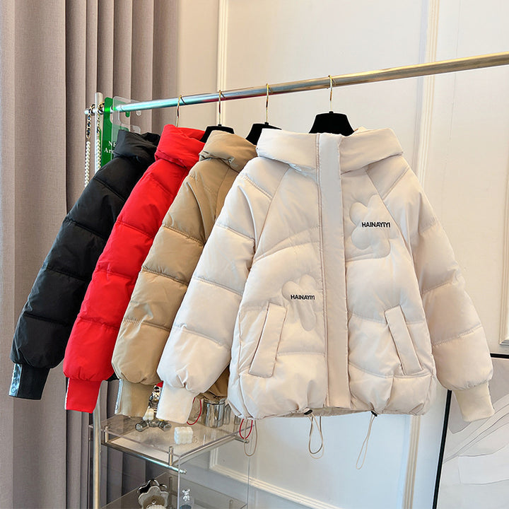 Trendy short down jacket for women with hood and practical pockets Lune London