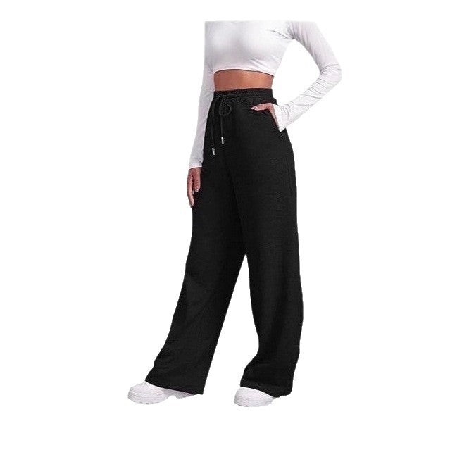 Comfortable athletic pants for ladies with elastic waist and side pockets Lune London