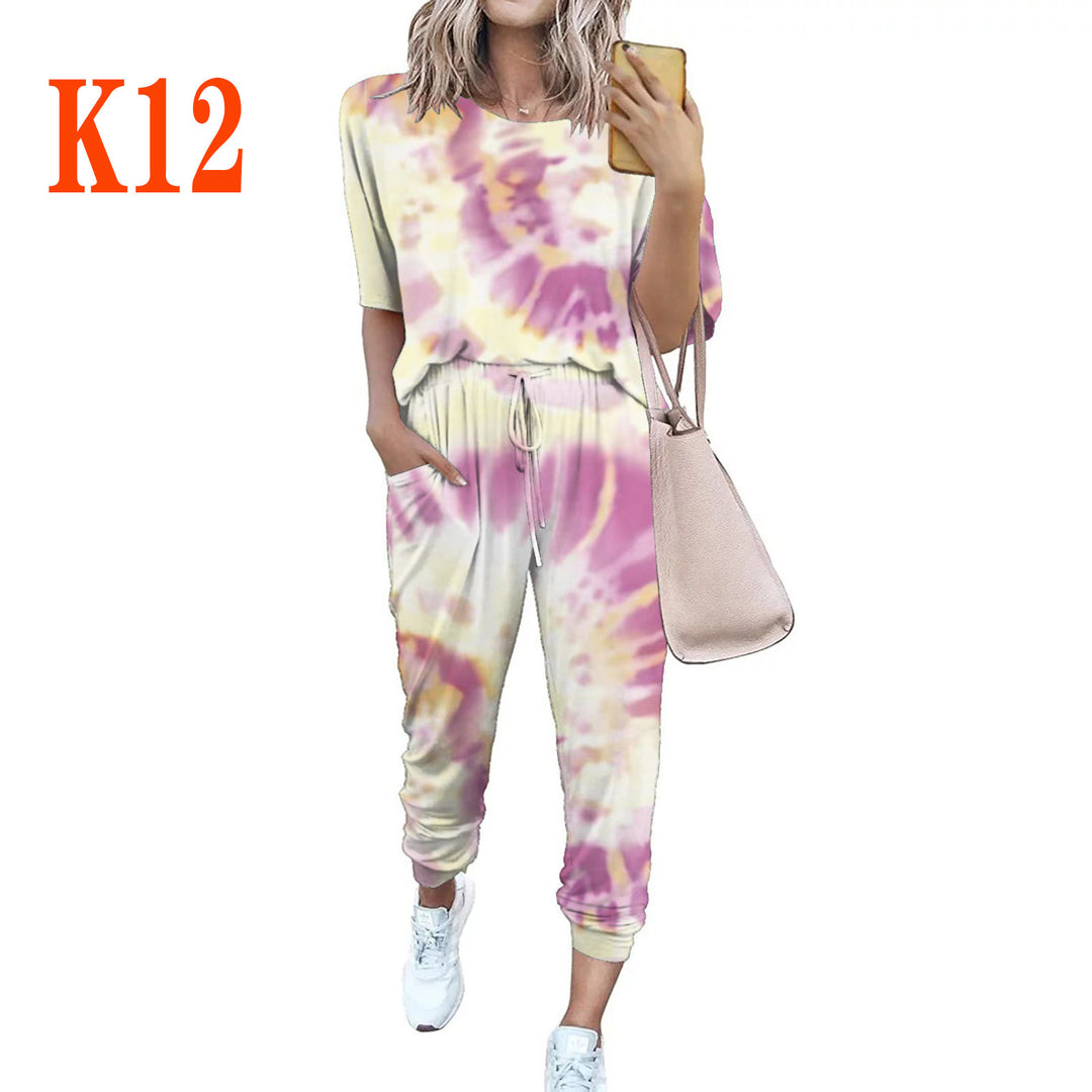 Ladies lightweight casual jumpsuit with a striking tie-dye pattern and practical pockets Lune London