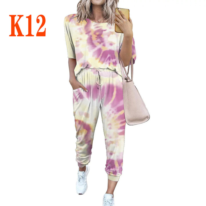 Ladies lightweight casual jumpsuit with a striking tie-dye pattern and practical pockets Lune London