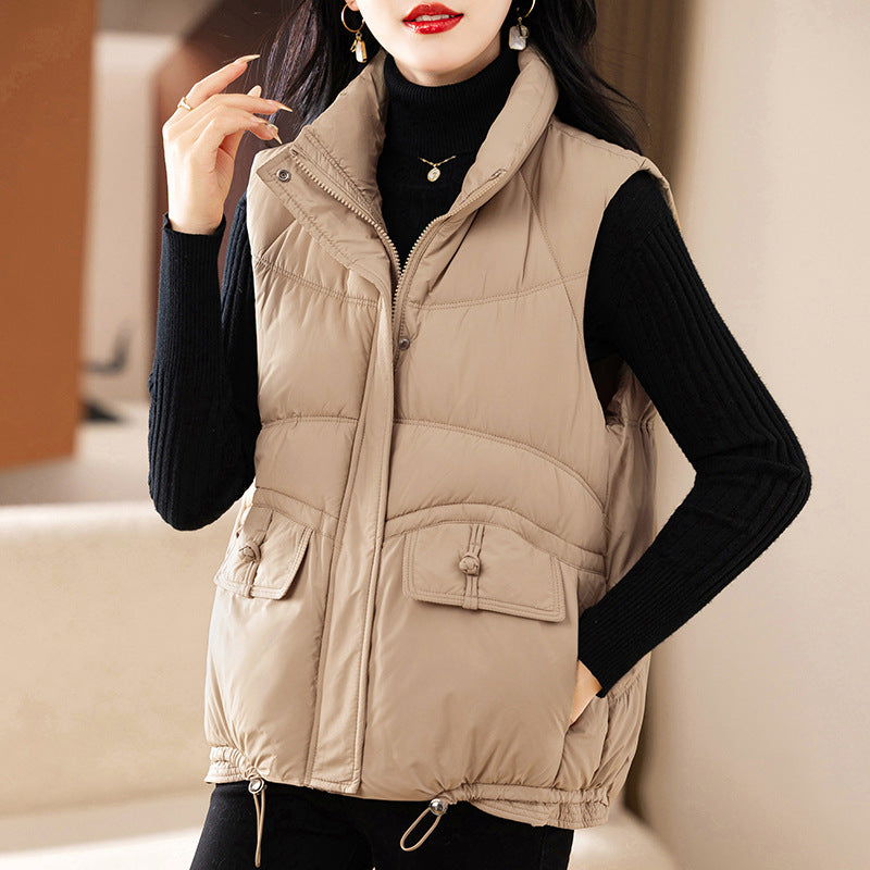 Quilted vest for women with practical pockets and adjustable hem Lune London