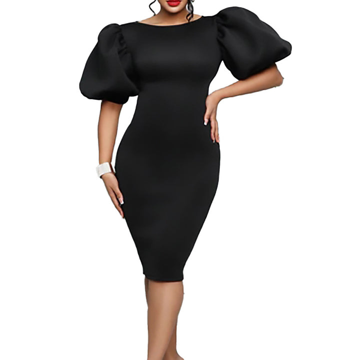 Fitted dress for ladies with voluminous puff sleeves Lune London