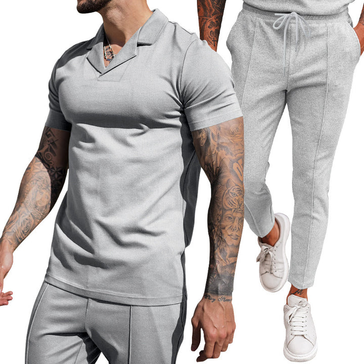Elegant men's short sleeve polo with textured design and matching slim-fit trousers Lune London