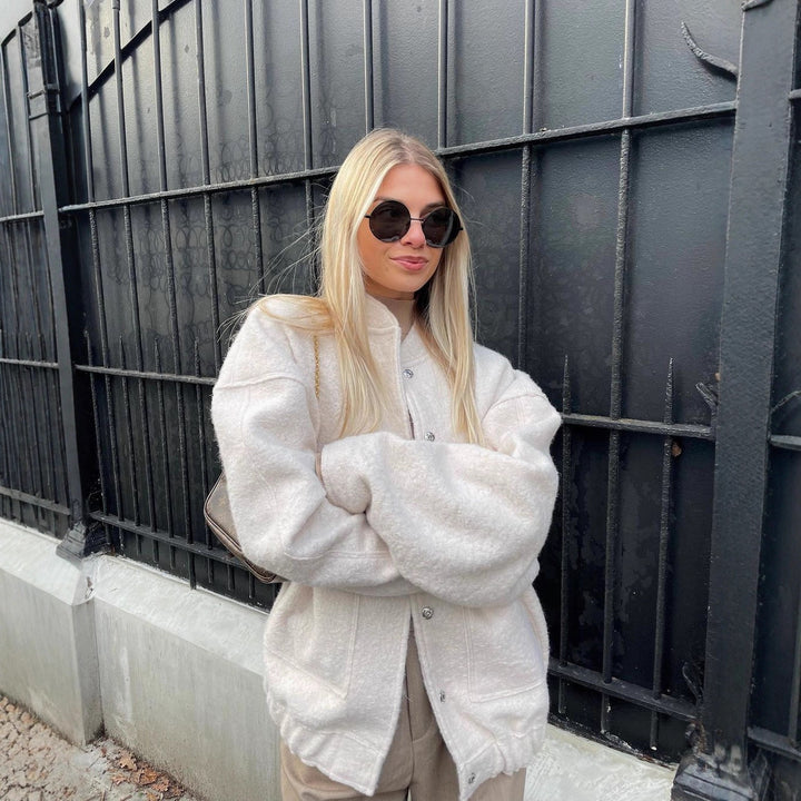 Oversized knit jacket for women in soft teddy fabric with a high collar and side pockets Lune London