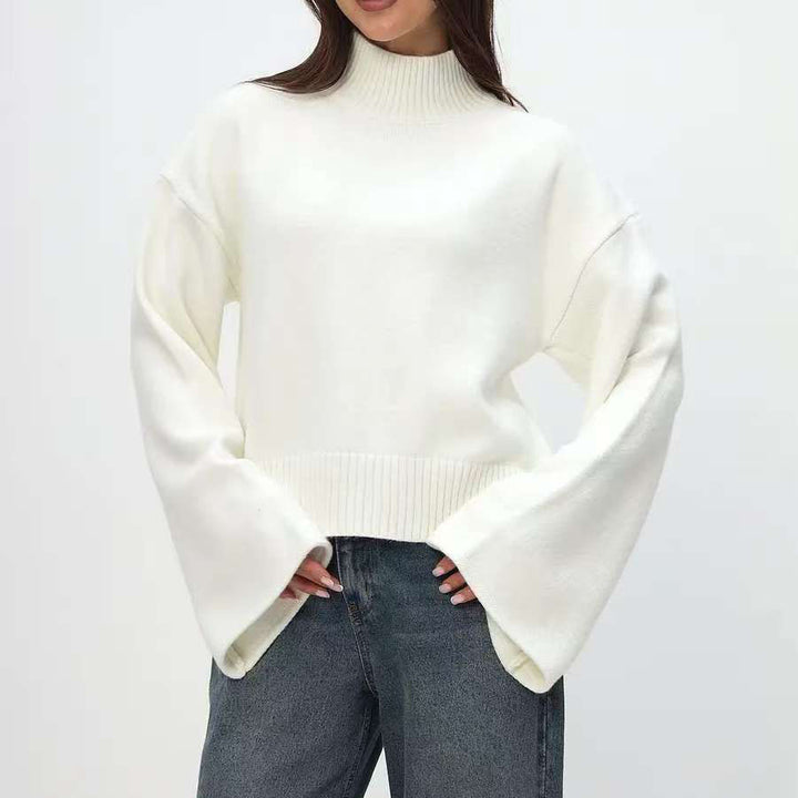 Trendy oversized knit sweater for women with wide sleeves and a high collar Lune London