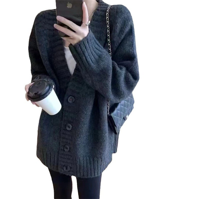 Ladies chunky knit cardigan with voluminous sleeves and buttoned neckline Lune London