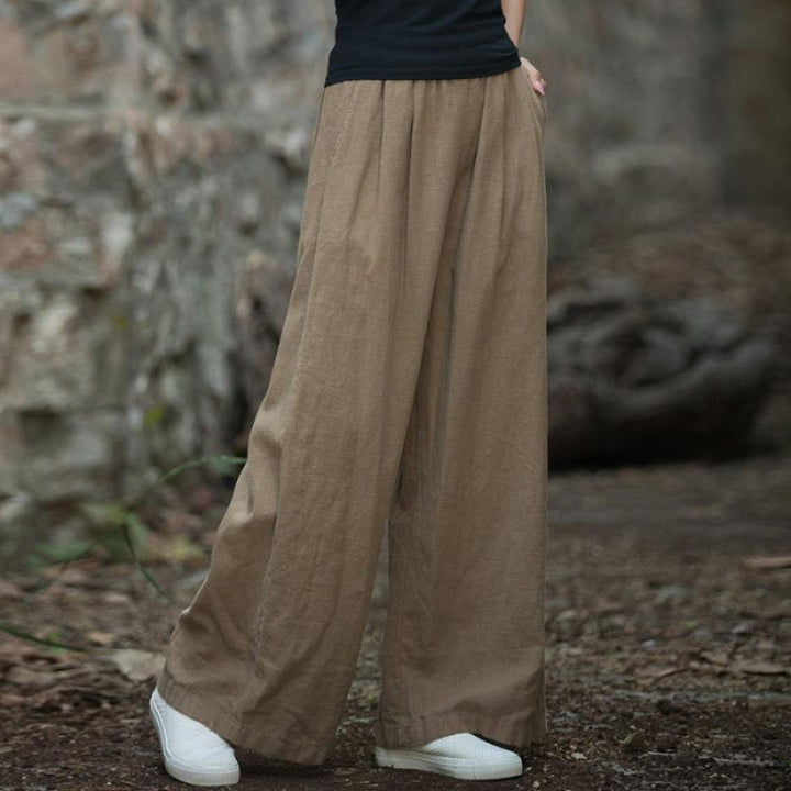Linen trousers for women in loose fit with elastic waistband and practical pockets Lune London