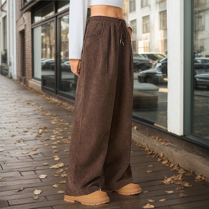 Pantalons larges en velours côtelé pour femmes avec taille élastique et poches pratiques Chic & Stil