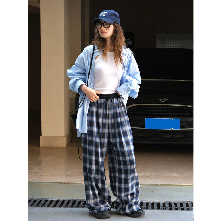 Pantalon à carreaux confortable pour femmes avec taille élastique et poches latérales Chic & Stil