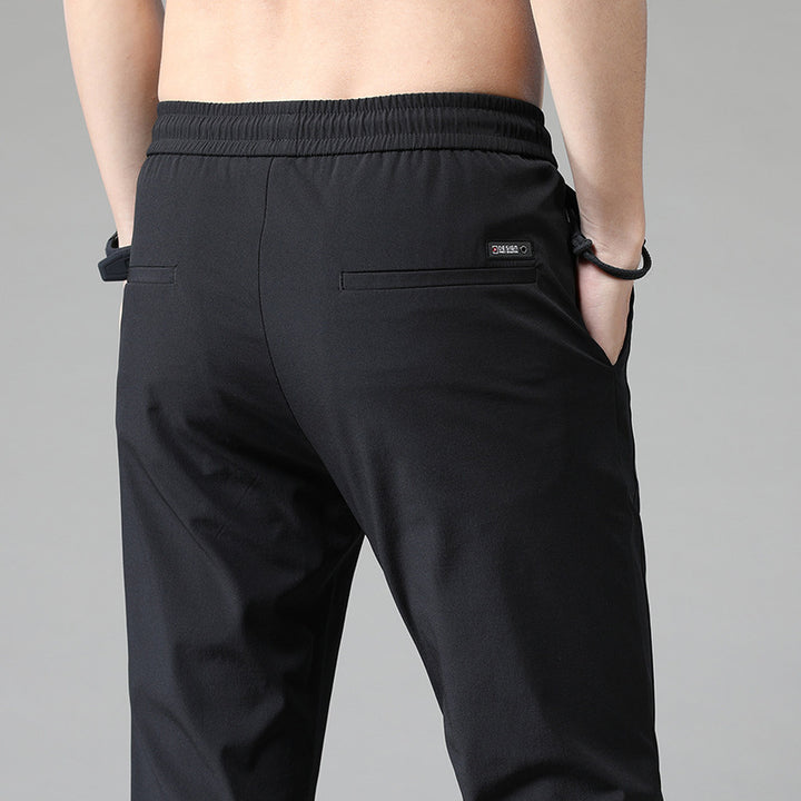 Men's sports pants with adjustable drawstring and zippered pockets on the sides Lune London
