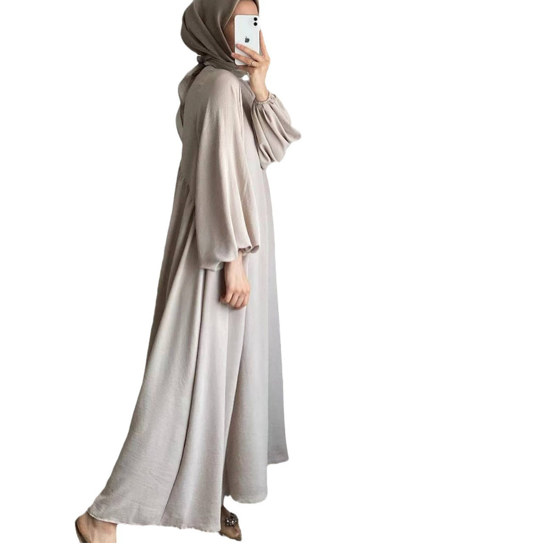 Elegant maxi dress for ladies with voluminous sleeves and a fluid cut Lune London