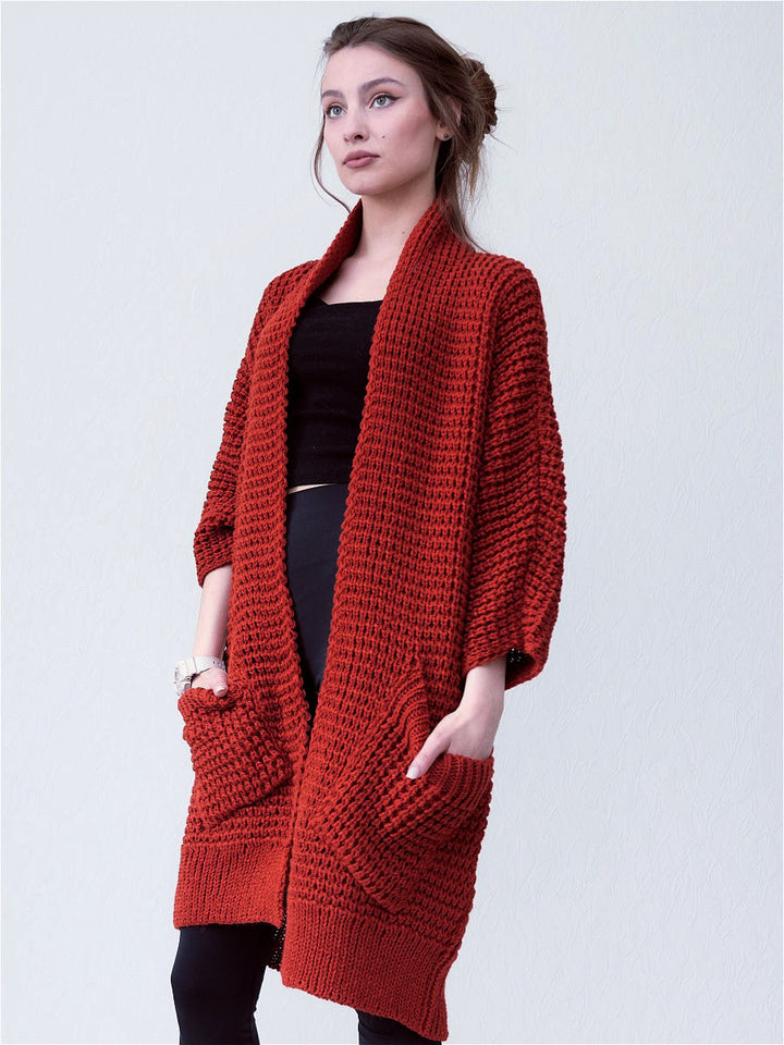 Ladies chunky knit cardigan with open fronts and practical pockets Lune London