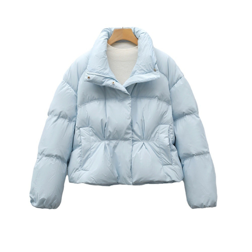 Short quilted jacket with high collar for women with practical pockets Lune London