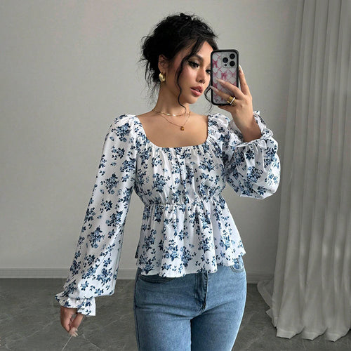 Women's blouse with floral design and voluminous sleeves Chic & Stil