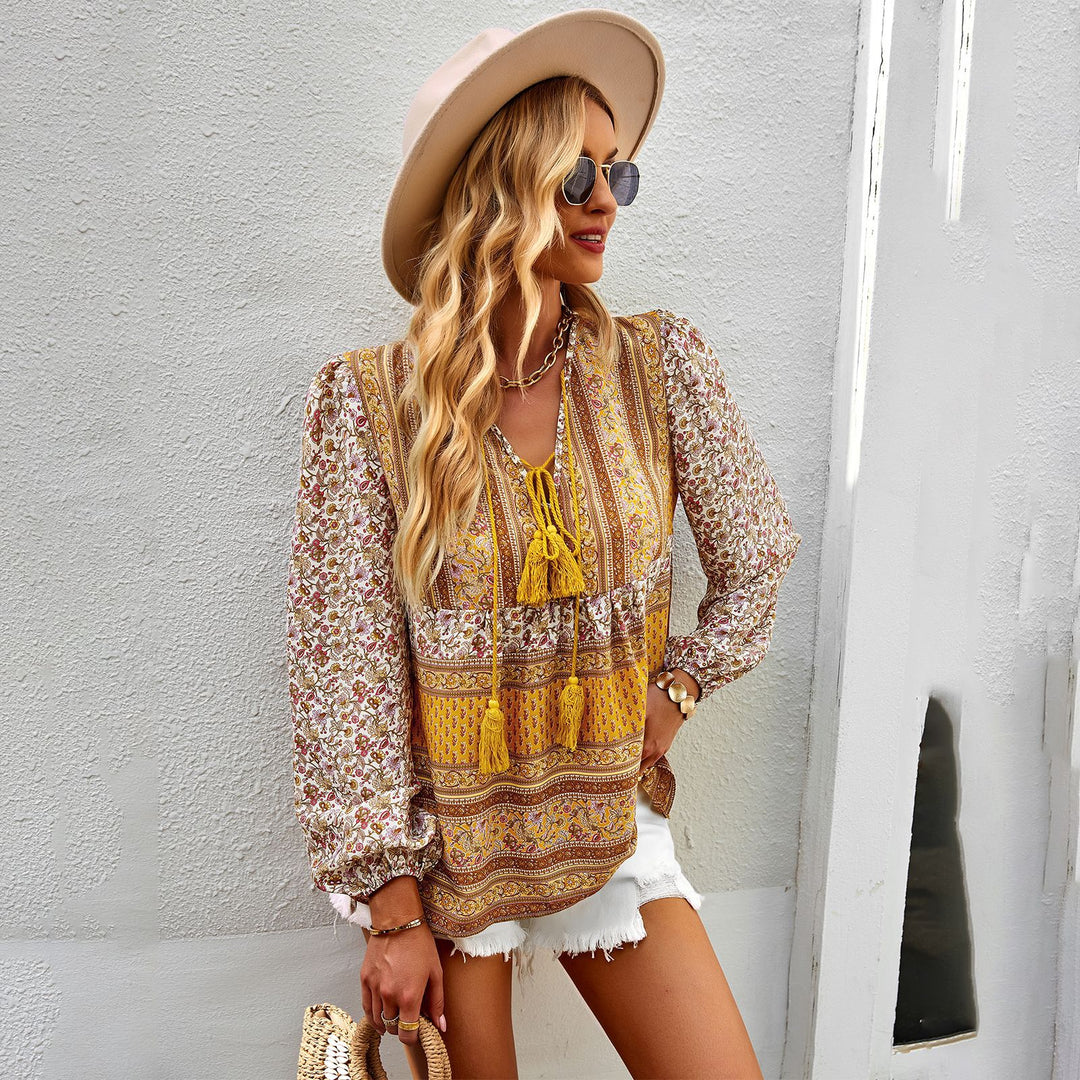 Airy women's blouse with trendy boho pattern and elegant ruffle details Lune London