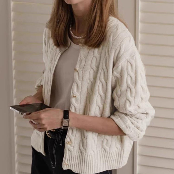Knitted jacket for women with cable pattern and elegant button details Lune London
