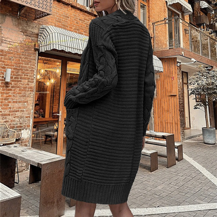 Ladies chunky knit cardigan with deep pockets and elaborate braids design Lune London