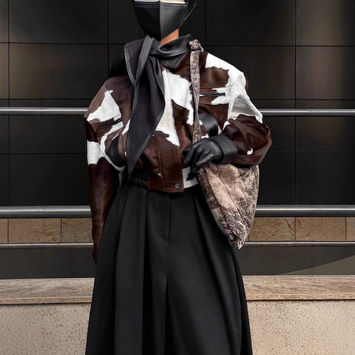 Ladies stylish faux leather jacket with a modern design in chic animal fur