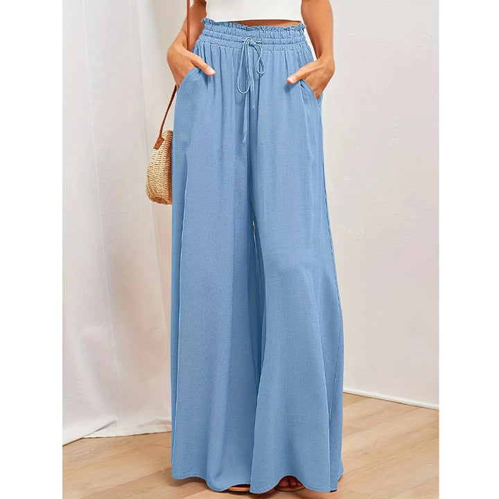 Women's loose summer pants with elastic waist and practical pockets Lune London