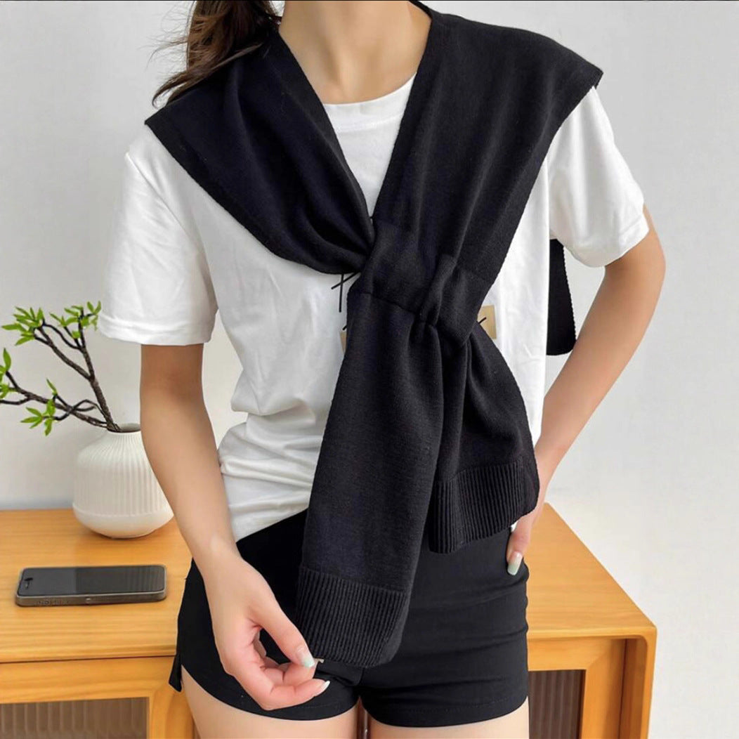 Trendy knitted scarf for women with bow detail Lune London