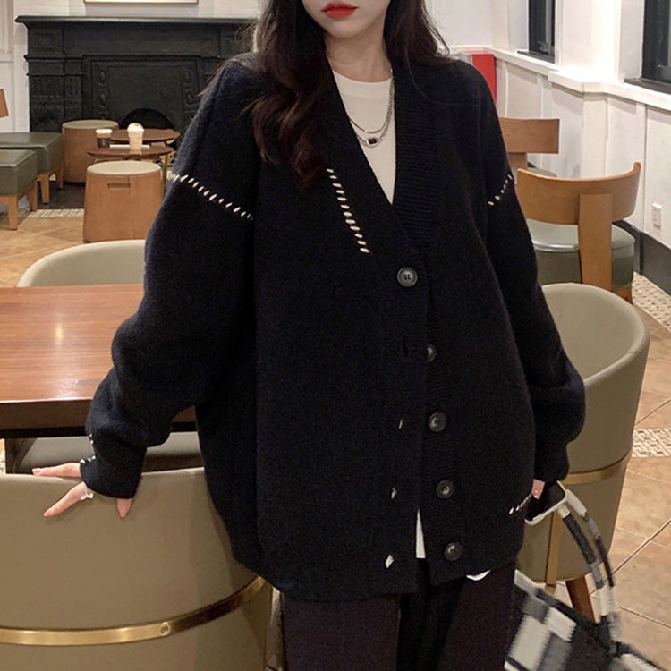 Cardigan tricoté large pour femmes avec détails de boutons et matériau doux Chic & Stil