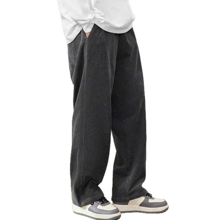 Women's wide corduroy trousers with elastic waistband and side pockets Chic & Stil