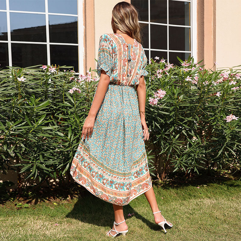 Boho midi dress for women with asymmetrical hem and striking print Lune London