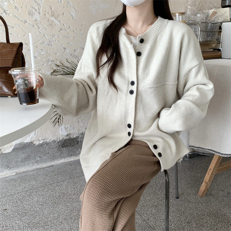 Ladies casual knitted cardigan with a fine texture and practical button details Lune London