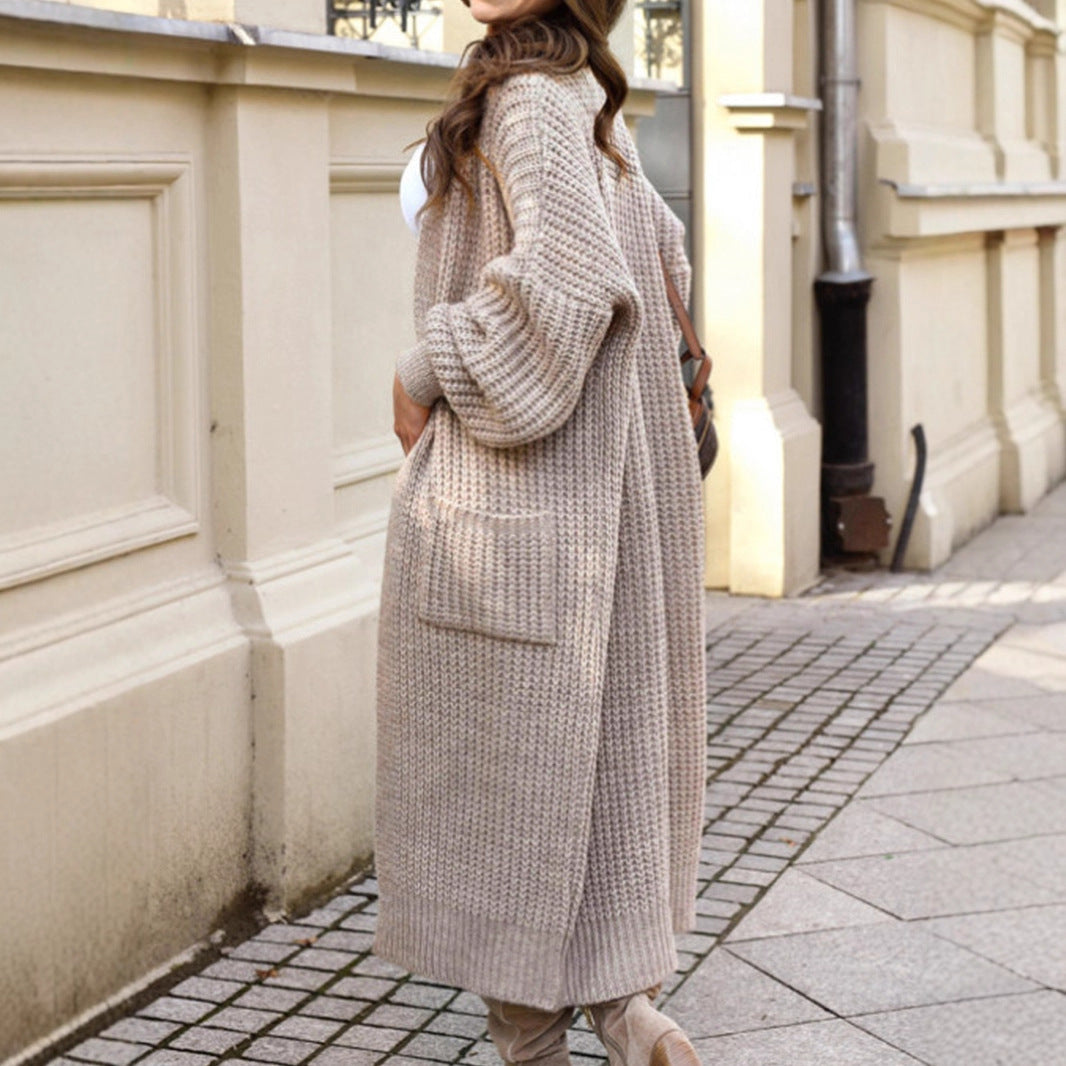 Knitted coat for women with pockets and balloon sleeves Lune London