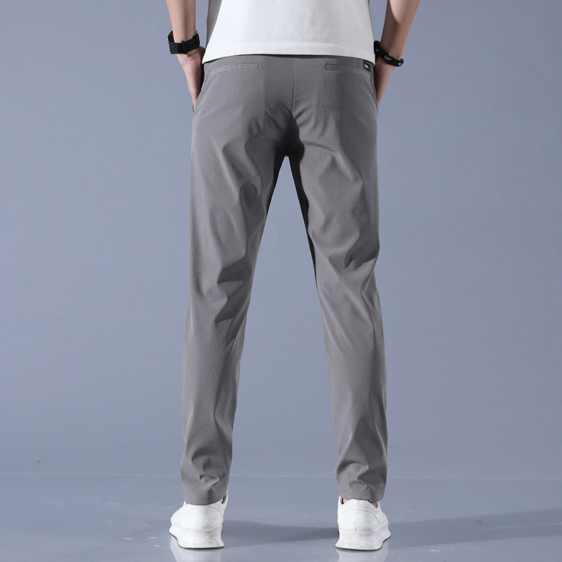 Sports jogger pants for men with elastic waist and practical zip pockets Lune London