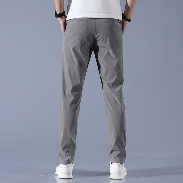 Sports jogger pants for men with elastic waist and practical zip pockets Lune London