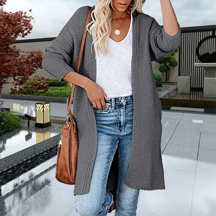 Women Long oversized knit cardigan with deep pockets and textured design Lune London